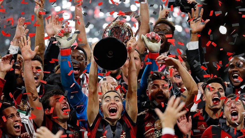 ATLANTA, GA - DECEMBER 08:  Atlanta United celebrates with the MLS Cup after their 2-0 over the Portland Timbers during the 2018 MLS Cup between Atlanta United and the Portland Timbers at Mercedes-Benz Stadium on December 8, 2018 in Atlanta, Georgia.  (Photo by Kevin C. Cox/Getty Images)