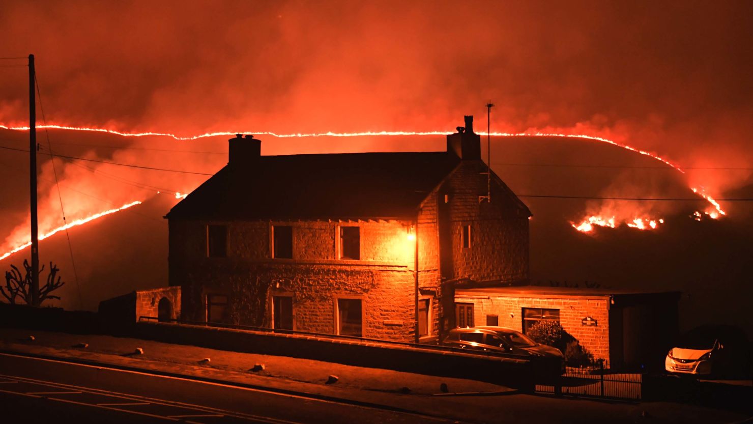 A wildfire burns on Tuesday, February 26, 2019, on Saddleworth Moor, near Marsden, England. 