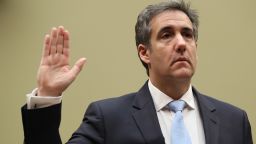 Michael Cohen, former personal lawyer to U.S. President Donald Trump, is sworn in during a House Oversight Committee hearing in Washington, D.C., U.S., on Wednesday, Feb. 27, 2019. Cohen plans to tell a congressional committee about alleged misdeeds by his former boss, claiming that Trump knew during the 2016 presidential election that his ally Roger Stone was talking to Julian Assange of WikiLeaks about a release of hacked Democratic National Committee emails. Photographer: Andrew Harrer/Bloomberg via Getty Images