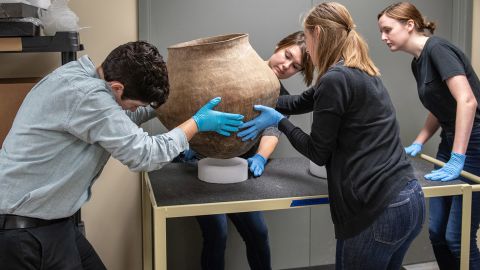 Students and staff from the Indiana University-Purdue University Indianapolis help care for the recovered artifacts in a facility outside Indianapolis.