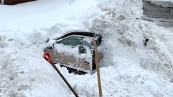 01 woman found in snow covered car