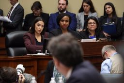 WASHINGTON, DC - FEBRUARY 27: (L-R) Rep. Alexandria Ocasio-Cortez (D-NY), Rep. Ayanna Pressley (D-MA) and Rep. Rashida Tlaib (D-MI) listen as Michael Cohen, former attorney and fixer for President Donald Trump, testifies before the House Oversight Committee on Capitol Hill February 27, 2019 in Washington, DC. Last year Cohen was sentenced to three years in prison and ordered to pay a $50,000 fine for tax evasion, making false statements to a financial institution, unlawful excessive campaign contributions and lying to Congress as part of special counsel Robert Mueller's investigation into Russian meddling in the 2016 presidential elections. (Photo by Chip Somodevilla/Getty Images)