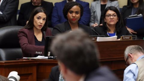 WASHINGTON, DC - FEBRUARY 27: (L-R) Rep. Alexandria Ocasio-Cortez (D-NY), Rep. Ayanna Pressley (D-MA) and Rep. Rashida Tlaib (D-MI) listen as Michael Cohen, former attorney and fixer for President Donald Trump, testifies before the House Oversight Committee on Capitol Hill February 27, 2019 in Washington, DC. Last year Cohen was sentenced to three years in prison and ordered to pay a $50,000 fine for tax evasion, making false statements to a financial institution, unlawful excessive campaign contributions and lying to Congress as part of special counsel Robert Mueller's investigation into Russian meddling in the 2016 presidential elections. (Photo by Chip Somodevilla/Getty Images)