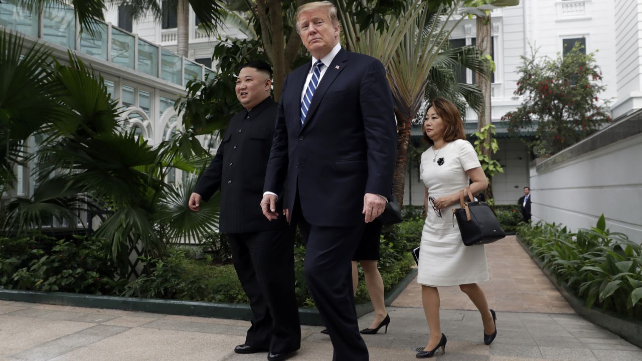 President Donald Trump and North Korean leader Kim Jong Un take a walk after their first meeting at the Sofitel Legend Metropole Hanoi hotel, Thursday, Feb. 28, 2019, in Hanoi. (AP Photo/Evan Vucci)