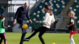 BELFAST, NORTHERN IRELAND - FEBRUARY 27:  Prince William Duke of Cambridge and Catherine, Duchess of Cambridge, play football during a visit the National Stadium in Belfast, home of the Irish Football Association on February 27, 2019 in Belfast, Northern Ireland. Prince William last visited Belfast in October 2017 without his wife, Catherine, Duchess of Cambridge, who was then pregnant with the couple's third child. This time the couple concentrate on the young people of Northern Ireland. Their engagements include a visit to Windsor Park Stadium, home of the Irish Football Association, activities at the Roscor Youth Village in Fermanagh, a party  at the Belfast Empire Hall, Cinemagic -a charity that uses film, television and digital technologies to inspire young people and finally dropping in on a SureStart early years programme. (Photo by Kelvin Boyes -  Pool/Getty Images)