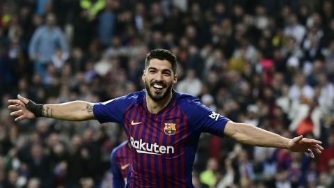 Suarez celebrates his second goal against Real.