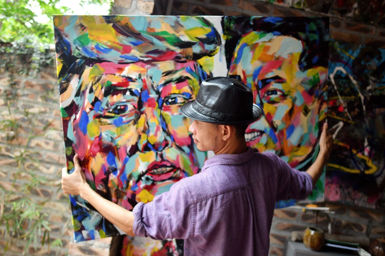 Tran has produced more than 100 portraits of Trump and Kim, although he's yet to sell any.