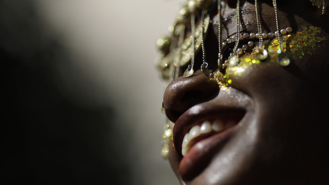 <strong>Rio de Janeiro, Brazil:</strong> A reveler in costume performs during the "Cordao do Boitata" street party on Sunday, February 24. It's one of the many warm-up events before the official start of Carnival on Friday, March 1, in Rio.