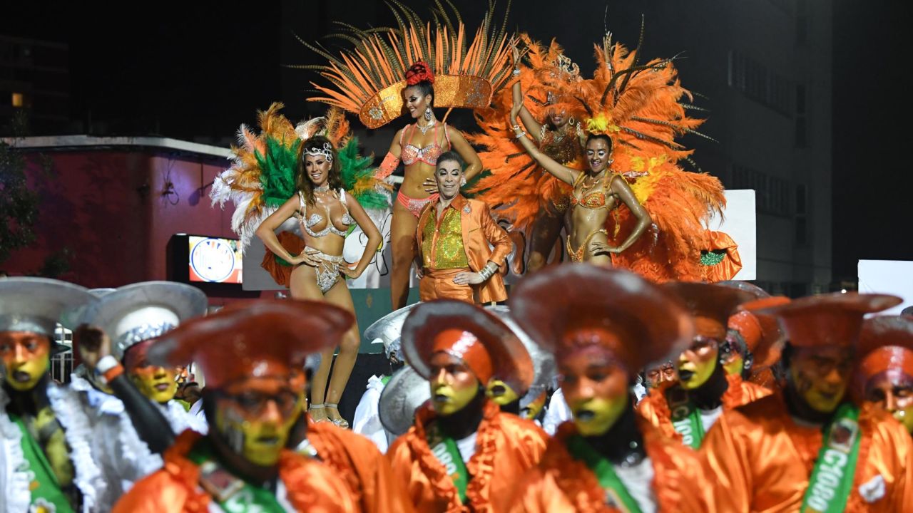<strong>Montevideo, Uruguay:</strong> Dancers and drummers forming part of a group known as a comparsa compete by dancing to the rhythm of the traditional candombe music on Friday, February 8. Candombe music has its origins from African slaves and is strongly rooted in Uruguayan culture.