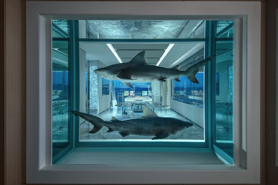<strong>Original art: </strong>"Winner/Loser," a 2018 piece by Damien Hirst, features two bulls sharks suspended in formaldehyde in a tank set into the wall of the Empathy Suite.
