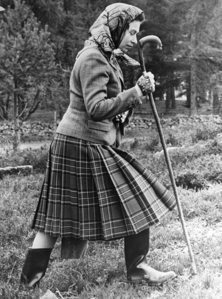 October 6, 1967: Queen Elizabeth in traditional tartan at the North of Scotland Gun Dog Association Open Stake Retriever Trials at Balmoral Castle.