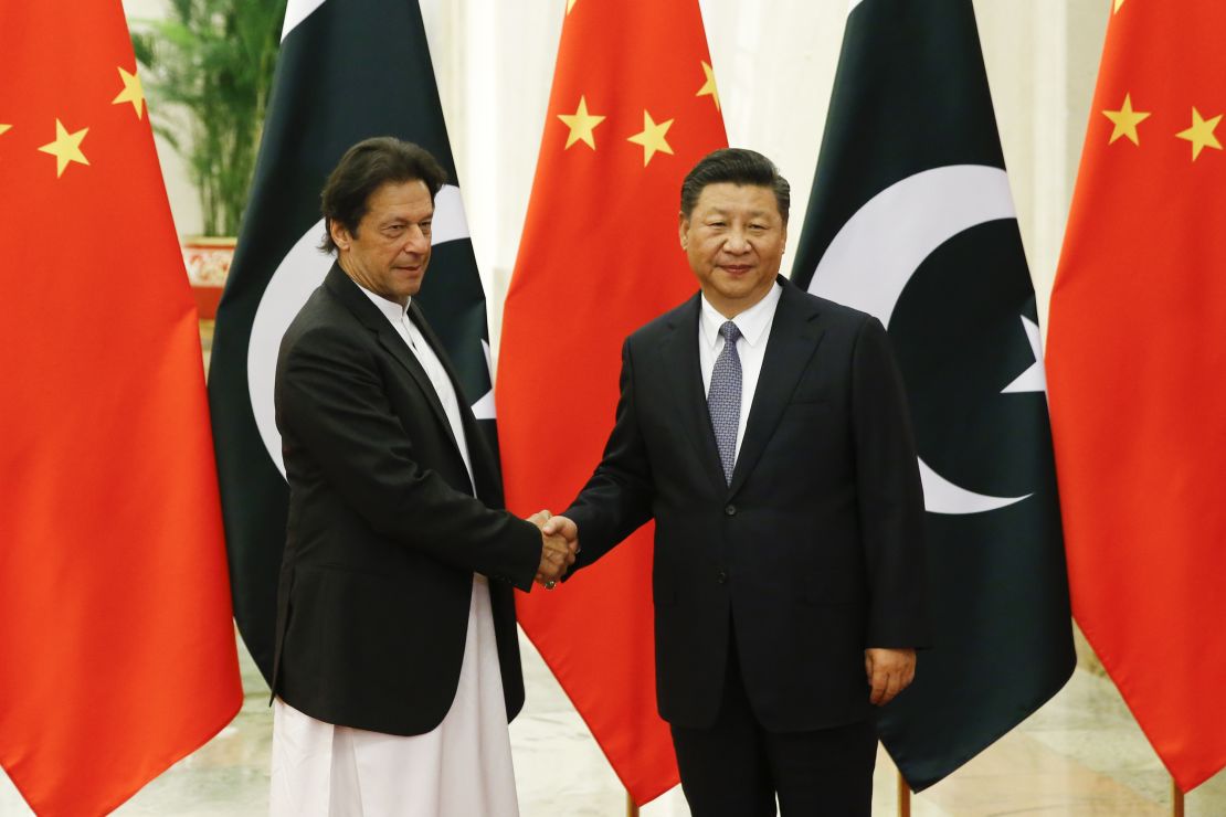 China's President Xi Jinping shakes hands with Pakistan's Prime Minister Imran Khan on November 2.