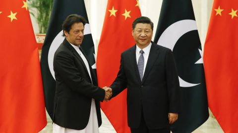 China's President Xi Jinping shakes hands with Pakistan's Prime Minister Imran Khan on November 2.