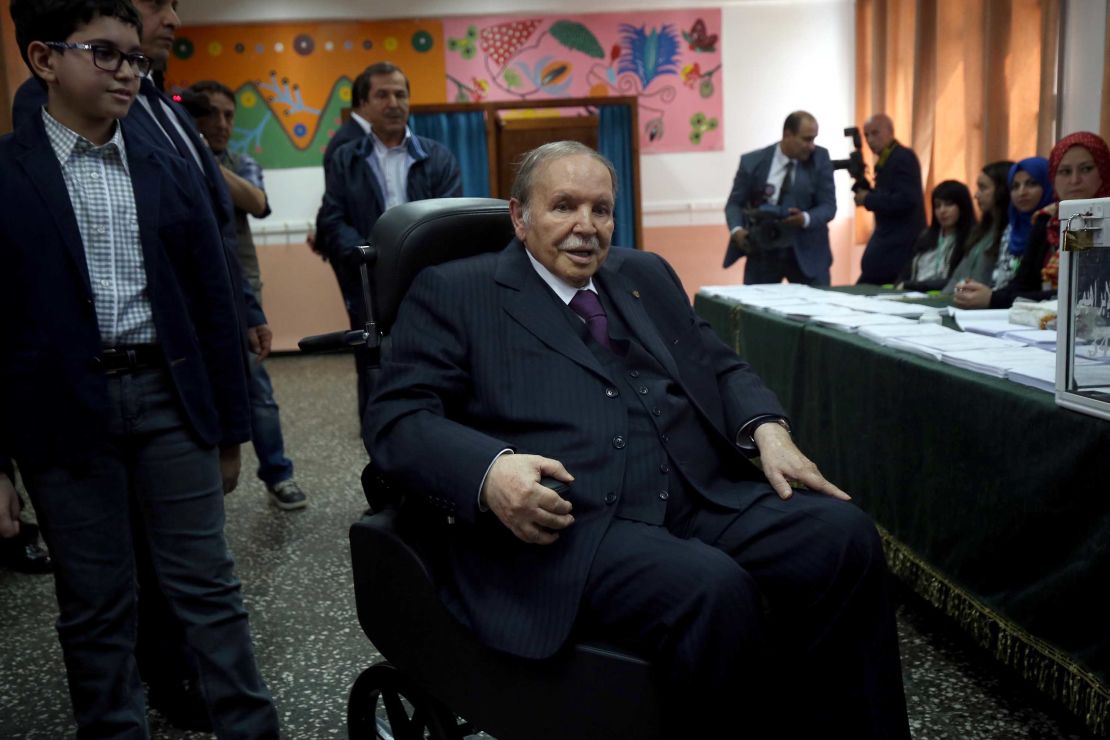 Algerian President Abdelaziz Bouteflika pictured in a wheelchair while casting a vote during the parliamentary elections of 2017.