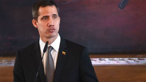Venezuelan opposition leader and self-declared acting president Juan Guaido, talks during a joint press conference with Paraguay's President Mario Abdo Benitez (out of frame), at the presidential palace in Asuncion, on March 01, 2019. - Venezuela's opposition leader Juan Guaido vowed on Thursday to return home "in the coming days... despite threats" from President Nicolas Maduro's regime, as he continues a tour of regional allies to rally international support. (Photo by NORBERTO DUARTE / AFP)        (Photo credit should read NORBERTO DUARTE/AFP/Getty Images)