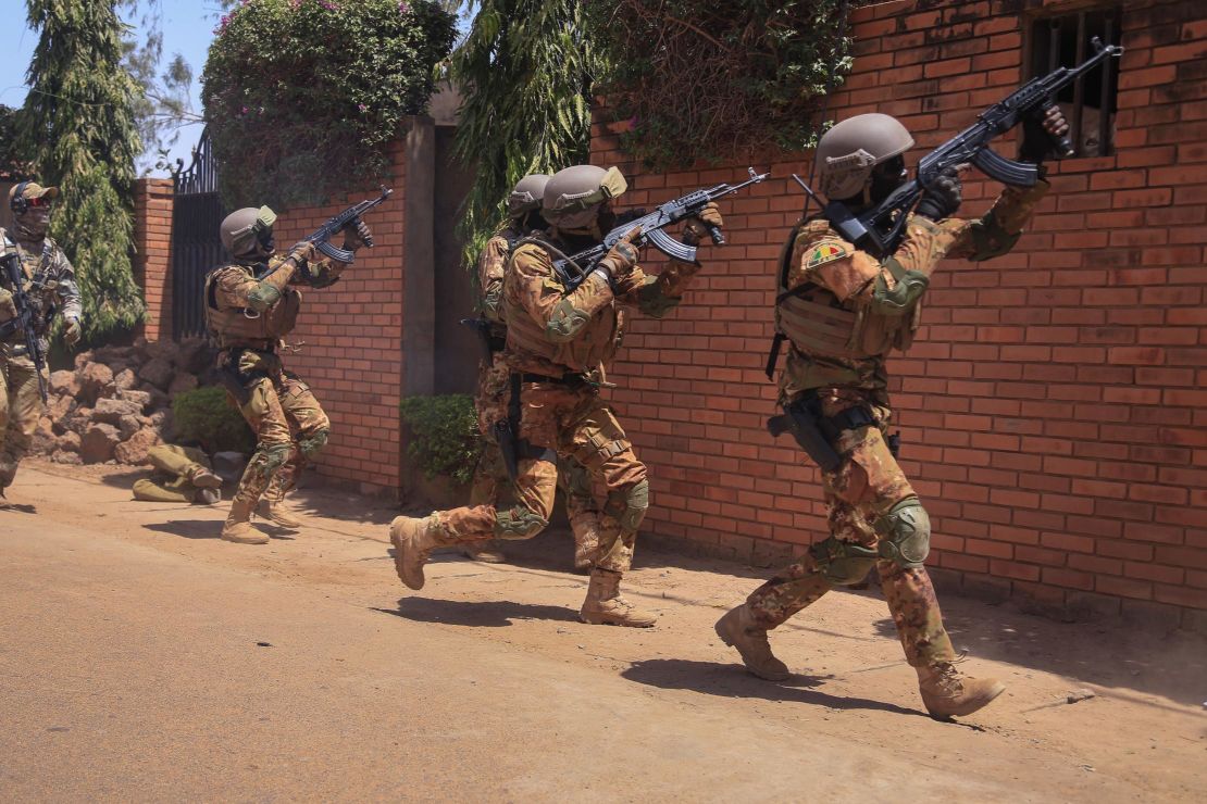 Malian soldiers, assigned to Battalion Autonomes des Forces Speciales tacticaly conduct close combat battle drills in Ouagadougou, Burkina Faso on Feb. 26, 2019. The close quarters battle training events like these are part of the Flintlock 2019 exercise scenarios. (U.S Army photo by Spc. Peter Seidler)
