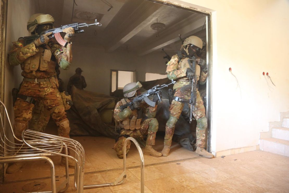 Malian soldiers tactically conduct close combat battle drills in Ouagadougou, Burkina Faso on Feb. 26, 2019. Flintlock is an annual training event where over 25 western and African nations participate in a joint training event. (U.S Army photo by Spc. Peter Seidler)