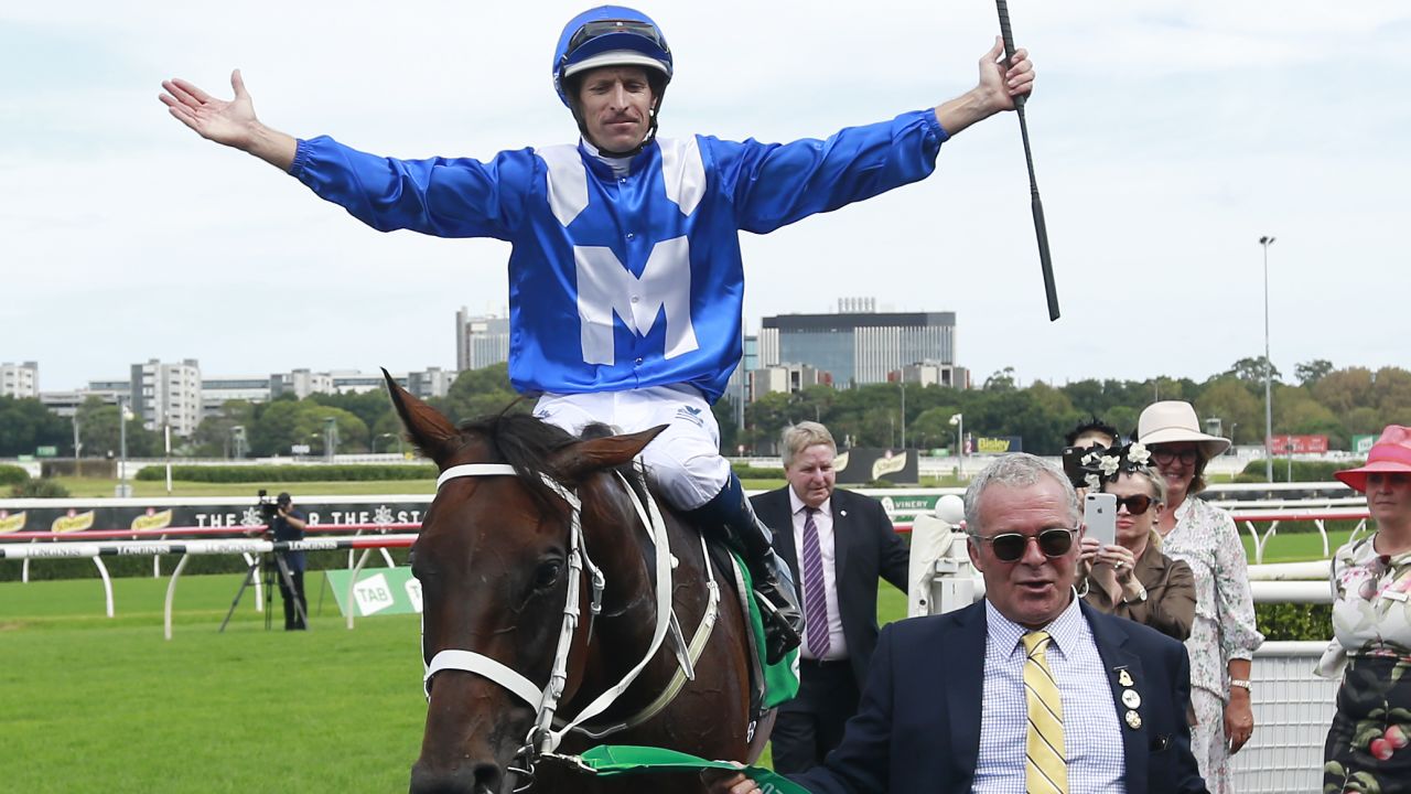 Jockey Hugh Bowman celebrates Winx's world record 23rd Group 1 victory after the mare claimed the Chipping Norton Stakes at Royal Randwick.