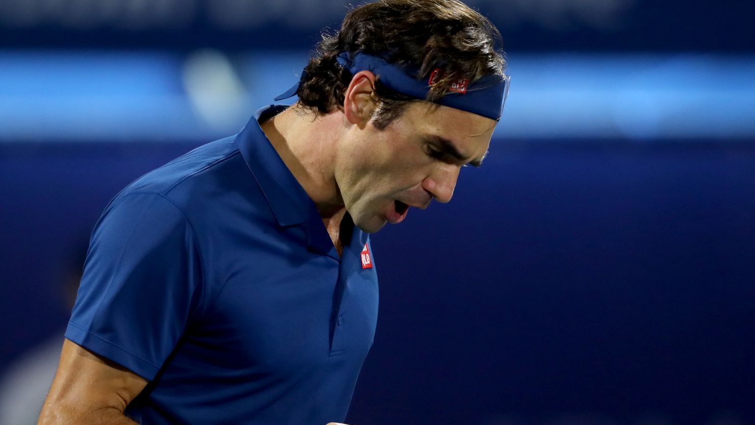 A pumped up Roger Federer reacts after winning the first set of the Dubai Open final against Stefanos Tsitsipas of Greece.