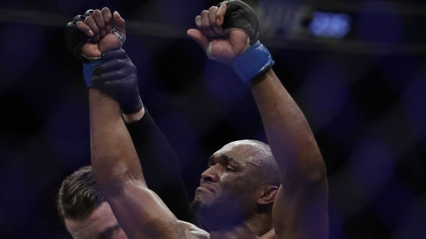 LAS VEGAS, NEVADA - MARCH 02: Kamaru Usman of Nigeria celebrates after defeating Tyron Woodley in a welterweight title bout during UFC 235 at T-Mobile Arena on March 02, 2019 in Las Vegas, Nevada. Usman won by unanimous decision.  (Photo by Isaac Brekken/Getty Images)