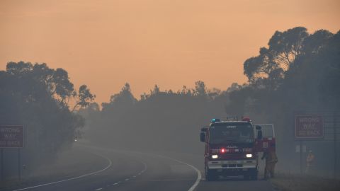 A Country Fire Authority (CFA) crew is seen on the Bunyip side of the Princes Highway on Sunday in the Australian state of Victoria.