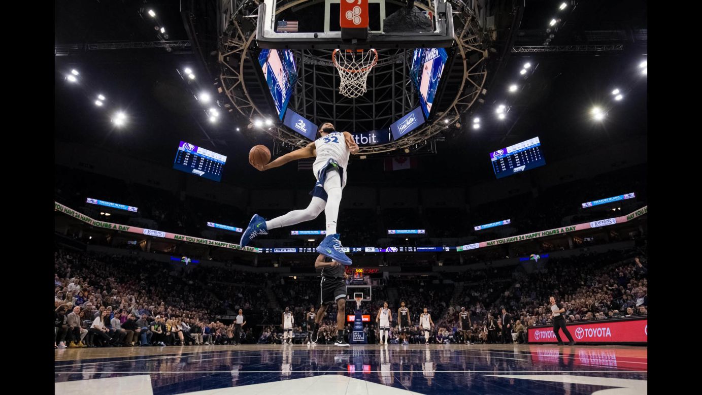 Minnesota Timberwolves center Karl-Anthony Towns dunks during the second quarter of an NBA game against the Sacramento Kings in Minneapolis, Minnesota, on Monday, February 25.