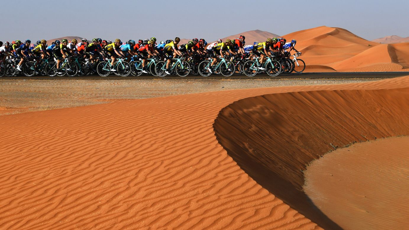 Cyclists ride through the desert during stage 3 of the UAE Tour in Jebel Hafeet, United Arab Emirates, on February 26.