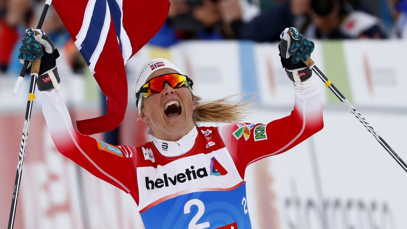 Norway's Therese Johaug celebrates winning the women's 30K Mass Start cross-country event at the Nordic Ski World Championships in Seefeld, Austria on Saturday, March 2.