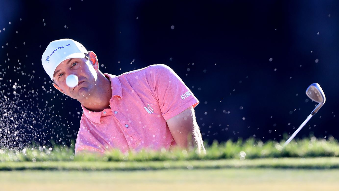 Lucas Glover plays a shot from a bunker during the first round of the Honda Classic at PGA National on February 28.