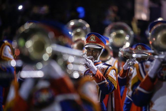 The Landry-Walker High School band performs during the Muses parade.