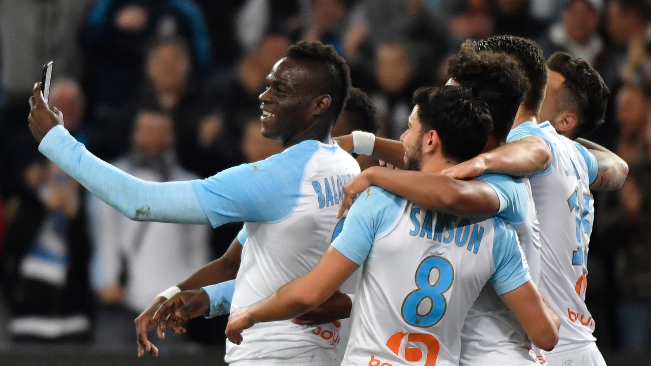 Balotelli takes a selfie with teammates after scoring during a Ligue 1 match