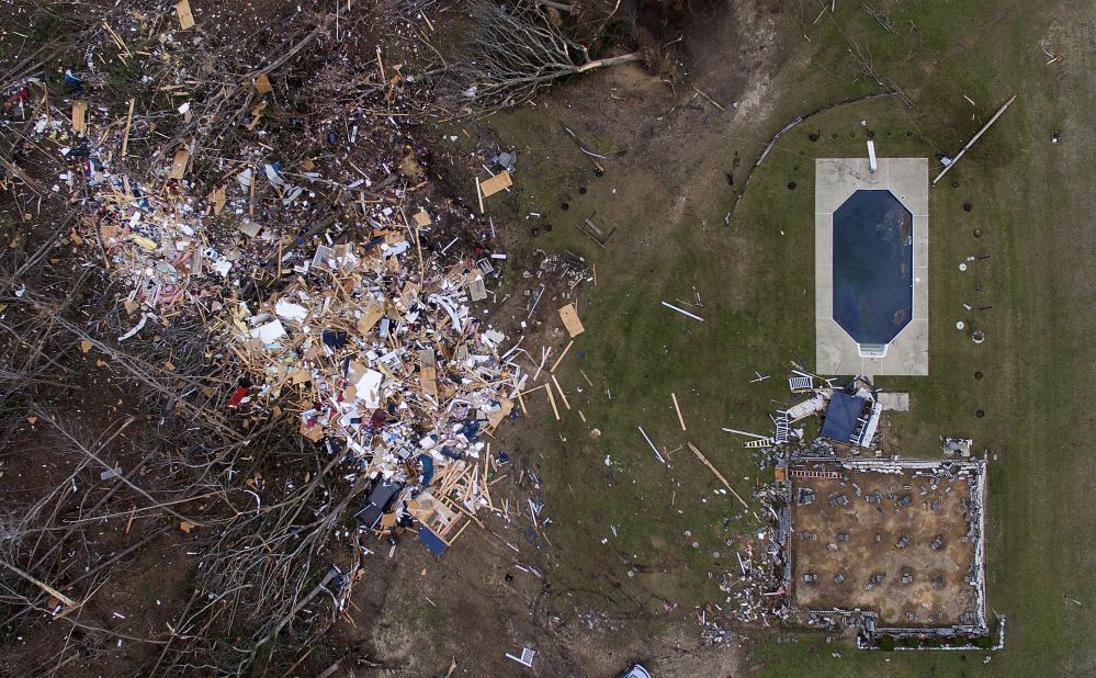 Debris litters a yard in Beauregard.