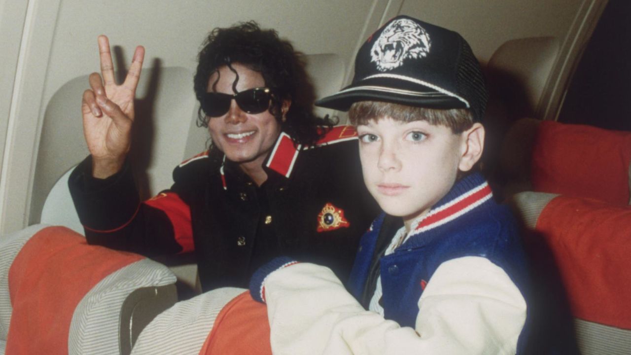 Michael Jackson with 10-year-old Jimmy Safechuck on a tour plane in July 1988.