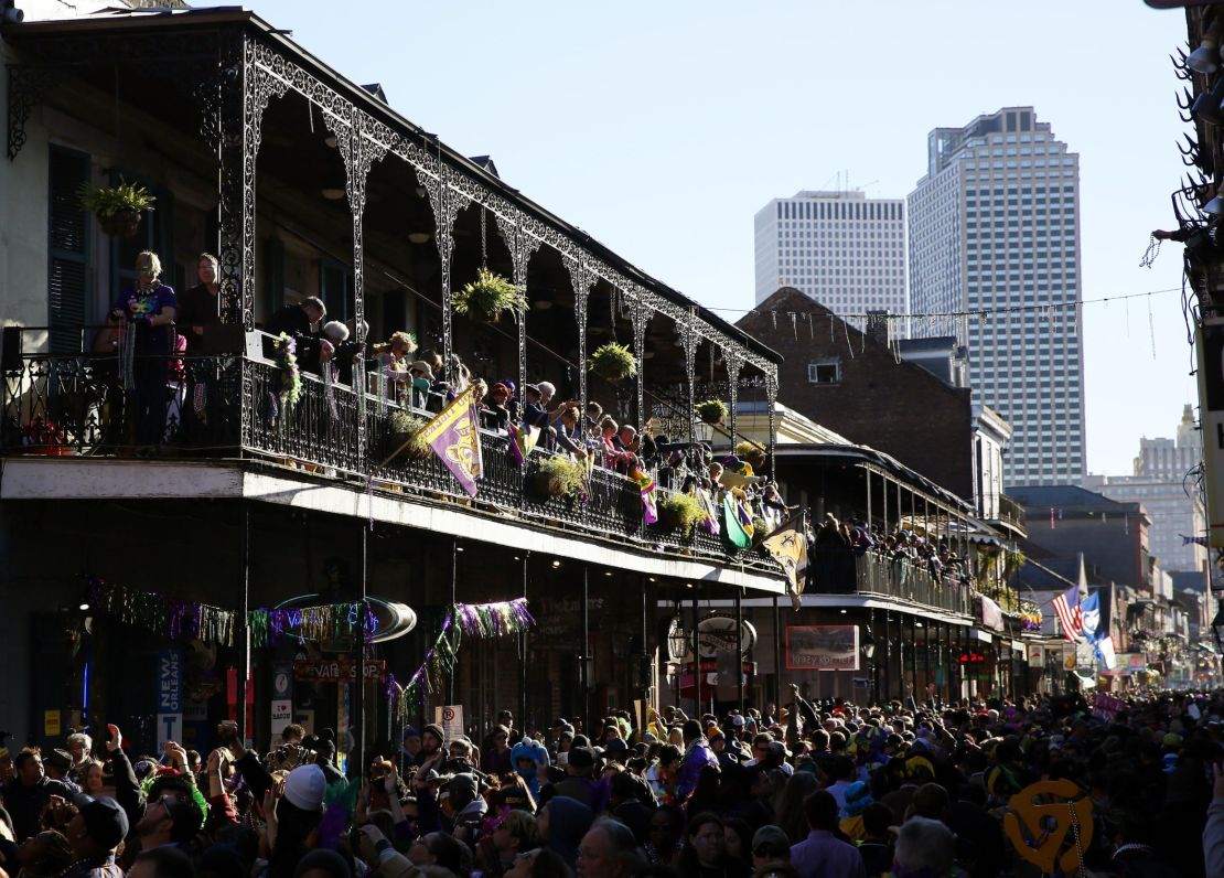 Following a long tradition, revelers pack Bourbon Street during Mardi Gras day back in 2016.