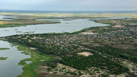 This aerial picture taken on July 16, 2016 shows Lake Chad in Africa's Sahel region. The lake's water supply has shrunk by over 90% since the 1960s. 