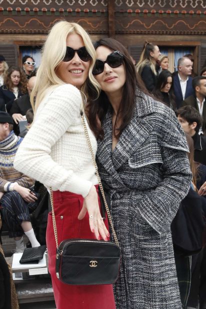 Claudia Schiffer, left, and actress Monica Bellucci were among the guests. 