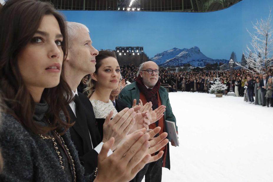 Actresses Alma Jodorowsky, left, and Marion Cotillard, second from right, applaud during the show.