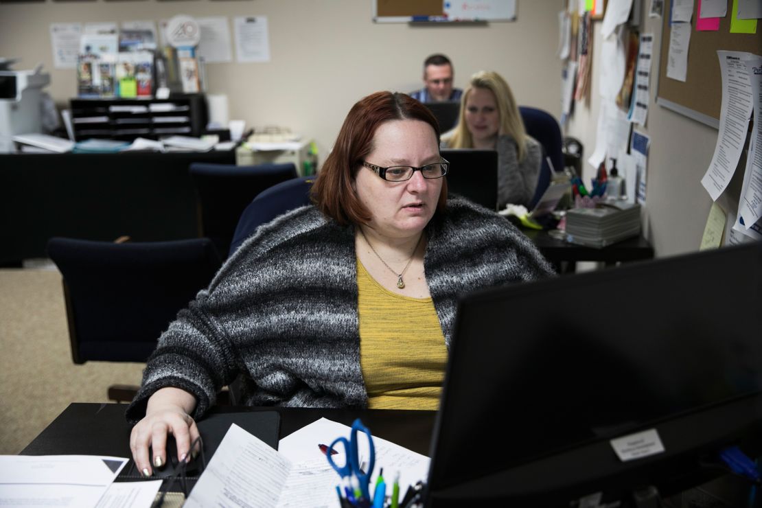 Trish Amato, a laid-off GM worker herself, works at the UAW's transition center helping people access benefits and training opportunities.