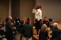 Activists disrupt the Sacramento city council meeting. 