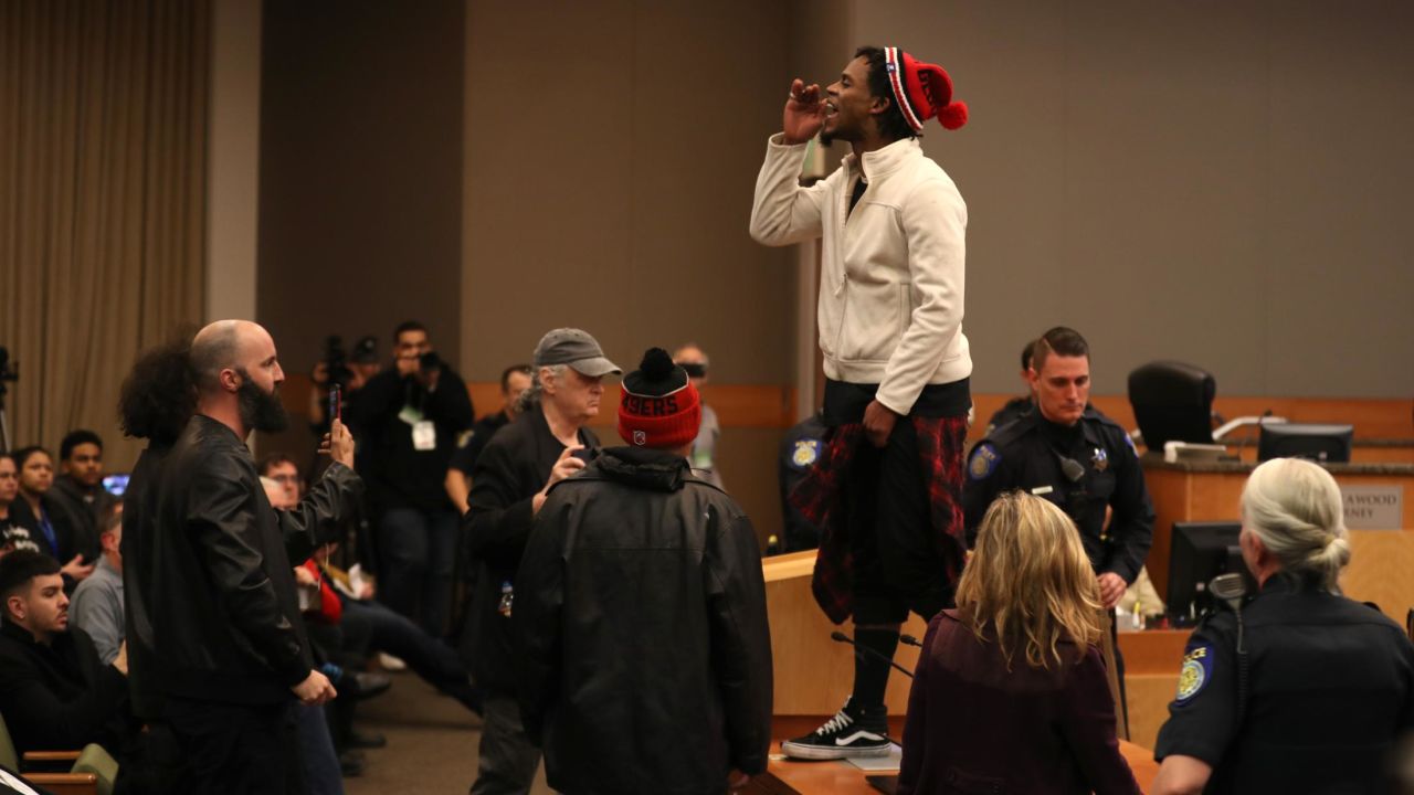 Activists disrupt the Sacramento city council meeting.