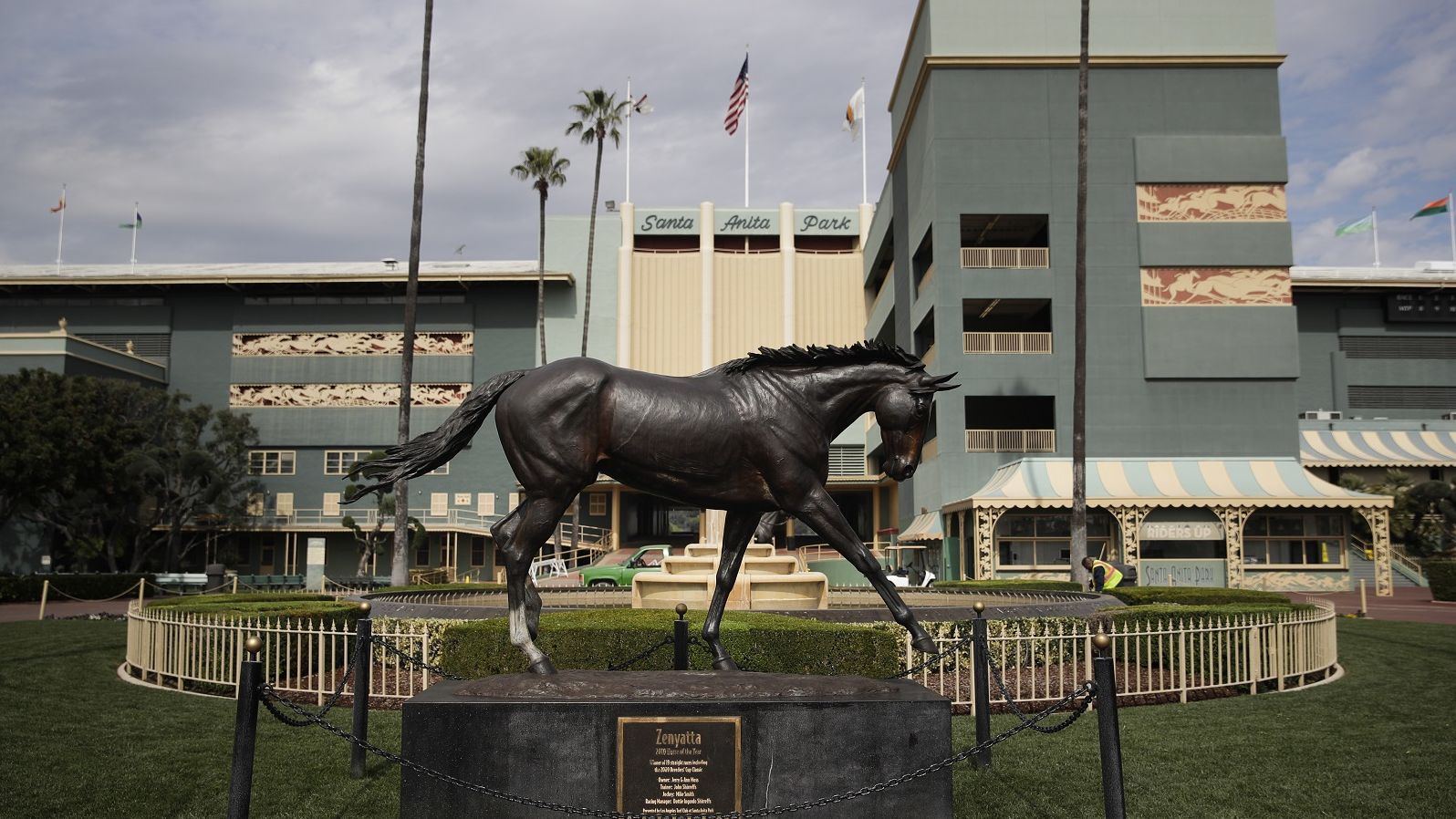 A statue of Zenyatta stands in the paddock gardens area at Santa Anita Park Tuesday.