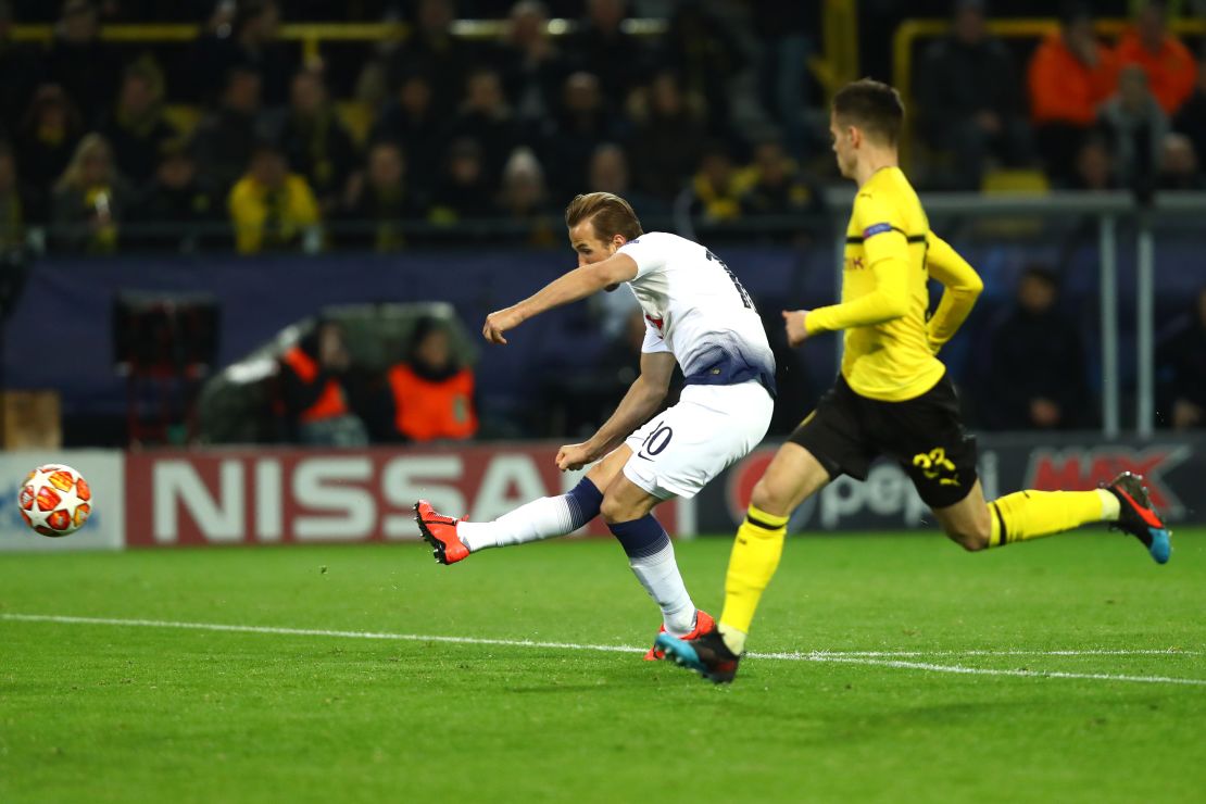 Harry Kane fires home his side's winning goal in Dortmund.