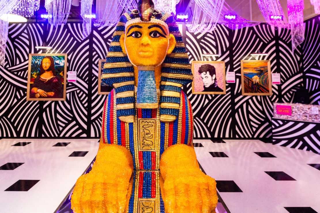Hundred of hours (approximately 317) and 7,800 pieces of candy later, the sphinx looms large at Candytopia.