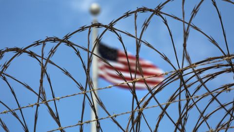 Razor wire tops the fence of the US prison at Guantanamo Bay on October 23, 2016 at the U.S. Naval Station at Guantanamo Bay, Cuba.  