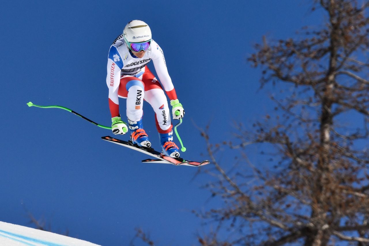 Switzerland's Priska Nufer leaps as she competes in the downhill at Crans-Montana.