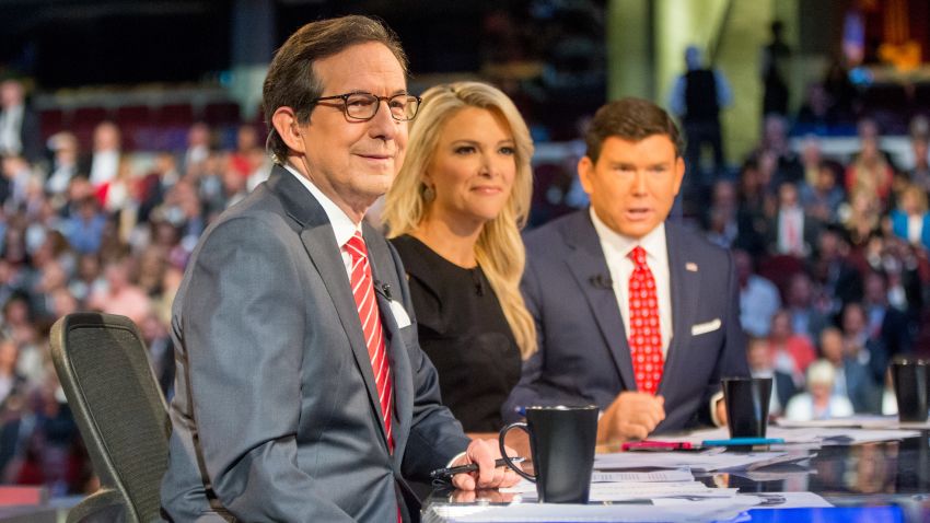 FILE - In this Aug. 6, 2015 file photo, Fox News moderators from left, Chris Wallace, Megyn Kelly and Bret Baier appear for the first Republican presidential debate in Cleveland. Fox News Channel says it will host the seventh Republican presidential debate, taking place next month in Des Moines, Iowa ahead of that state's caucuses. Fox said Monday, Dec. 21, 2015, that the two-hour debate on Jan. 28 will be anchored by Bret Baier, Megyn Kelly and Chris Wallace.  (AP Photo/Andrew Harnik, File)