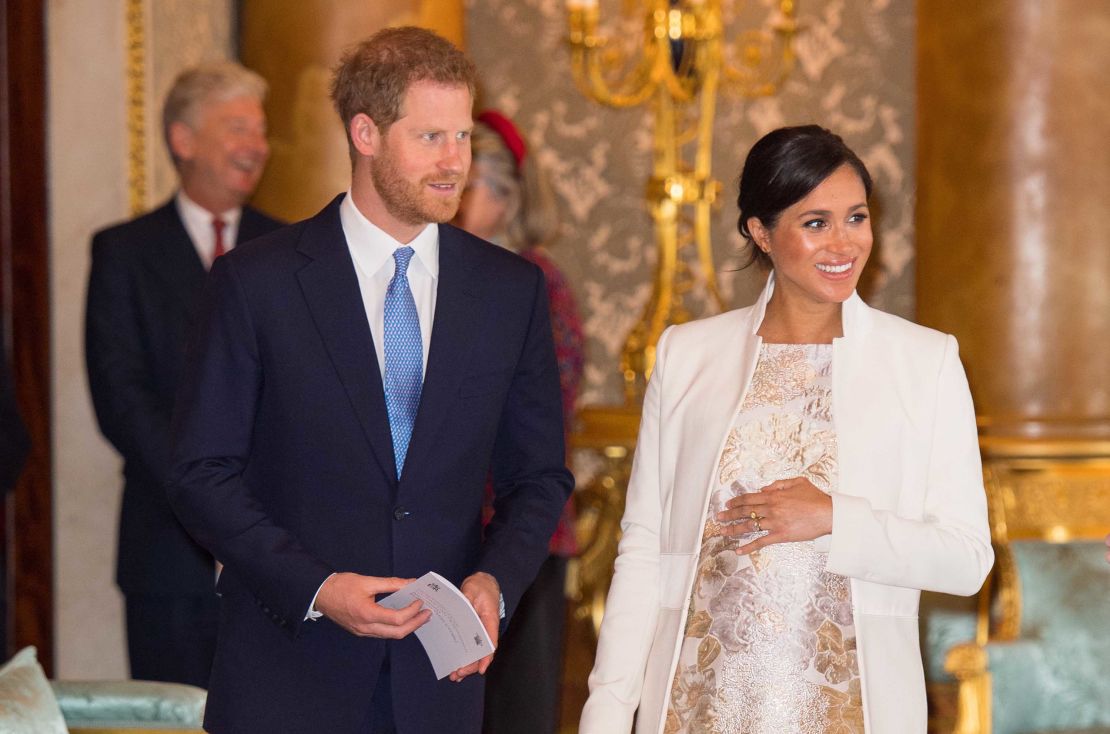 Harry and Meghan attend a reception for the Prince of Wales at Buckingham Palace on March 5, 2019.