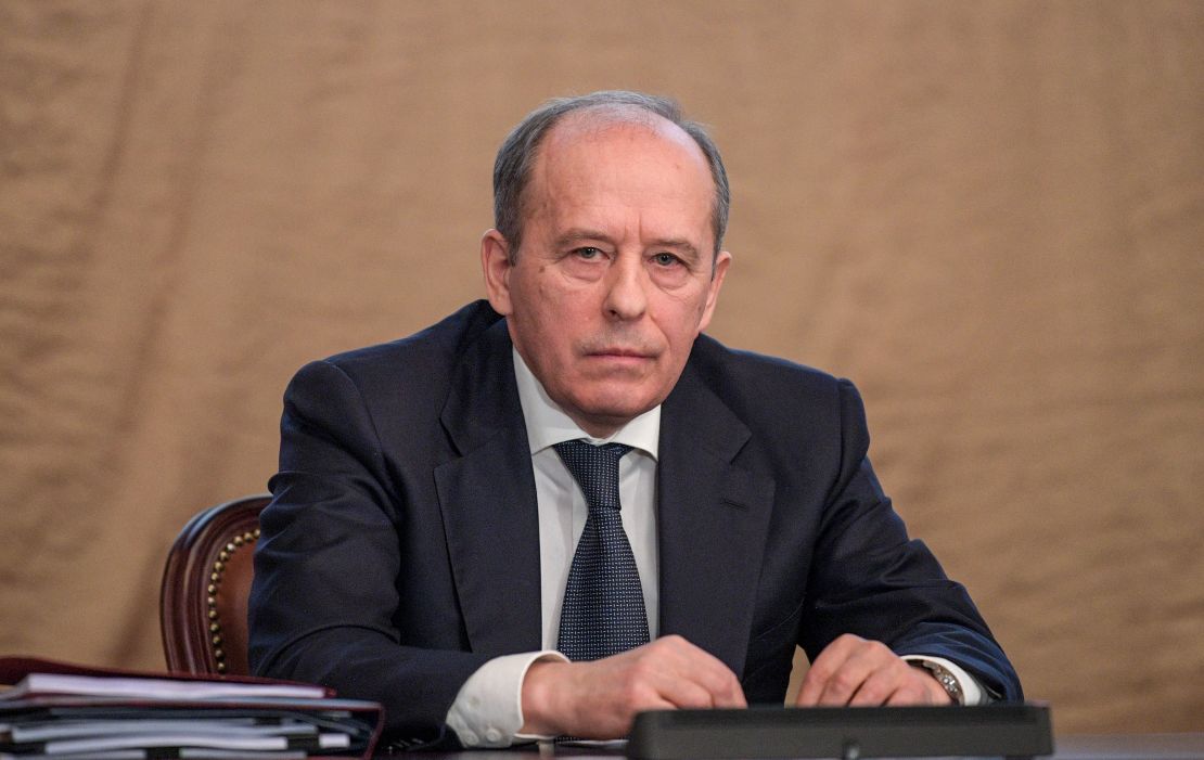 Alexander Bortnikov, director of the FSB, sat alongside Vladimir Putin as he delivered his speech. 