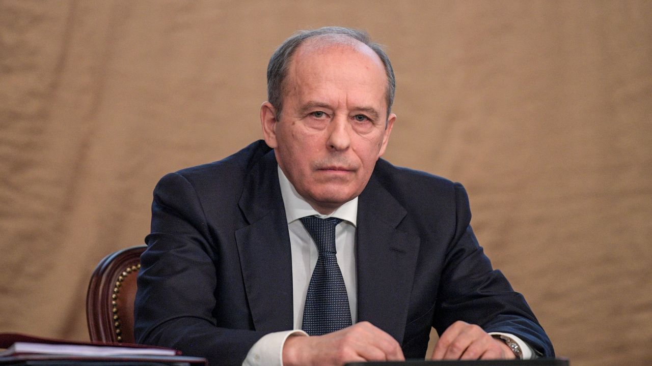 Alexander Bortnikov, director of the FSB, sat alongside Vladimir Putin as he delivered his speech.