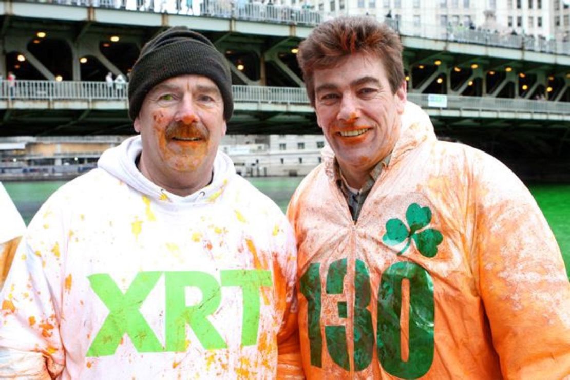 Tom Rowan, left, and his brother Robert Rowan are covered in leprechaun dust -- the magic powder that turns the Chicago River green.